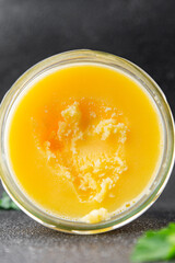 Ghee butter or clarified butter delicious gourmet food background on the table rustic food top view copy space keto and paleo diet vegetarian and vegan food