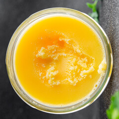 Ghee butter or clarified butter delicious gourmet food background on the table rustic food top view copy space keto and paleo diet vegetarian and vegan food