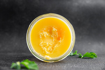 Ghee butter or clarified butter delicious gourmet food background on the table rustic food top view copy space keto and paleo diet vegetarian and vegan food