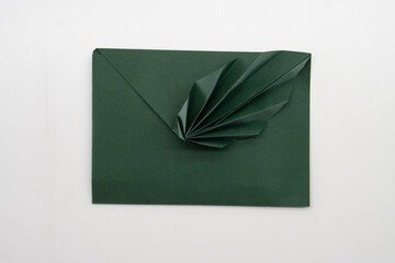 Paper envelope made of paper on a white background. Origami. Paper crafts