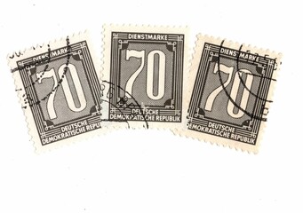 A set of vintage postage stamps from Germany on a white background.