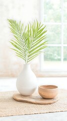 Palm frond vase for wooden bowl, bright room.
