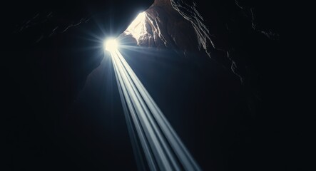 Light in the dark, Divine like light sunbeam coming to dark cave giving hope