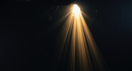 Light in the dark, Divine like light sunbeam coming to dark cave giving hope