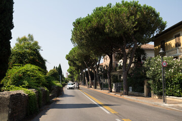 A vibrant and lively street scene in Rimini, Italy, capturing the charm of this historic coastal town. 