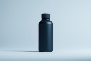 Contemporary metal water bottle in matte finish, standing upright against a pristine white background, reflecting its sleek design.