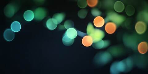 Obraz premium Colorful bokeh lights create an abstract atmosphere with natural green elements and vibrant oranges