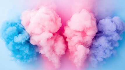 Colorful puffs of smoke are rising against a light background