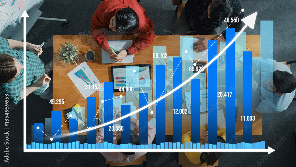 Poster an overhead view of a workplace showing a growth chart alongside team members engaging in discussion