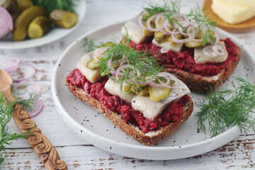 Scandinavian sandwiches with herring and beetroot