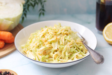 A bowl with coleslow salad