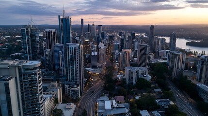 Obraz premium Aerial view of a vibrant city skyline at dusk showcasing modern architecture and urban life : Generative AI