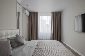 Flat TV in the bedroom interior