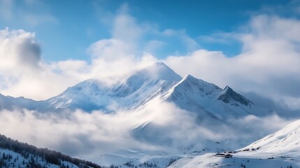 Naklejka premium Majestic snowcovered mountain peaks under a serene blue sky surrounded by soft white clouds : Generative AI