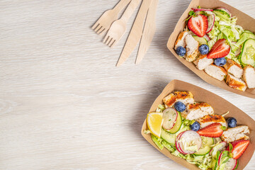 food to go, Healthy take away food in disposable eco friendly paper containers, top view