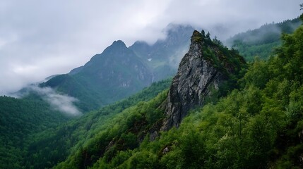 Dramatic Landscape of Majestic Mountains Surrounded by Lush Green Forest Under Cloudy Skies : Generative AI