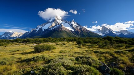 Fototapeta premium Majestic Mountain Range Under Bright Blue Sky with Lush Green Terrain : Generative AI
