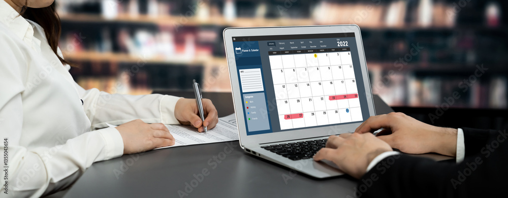 Aufkleber calendar on computer software application for brisk schedule planning for personal organizer and onl
