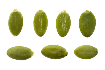 Ripe, green pumpkin seeds isolated on white background, top view. Pumpkin seeds close-up on white isolated background, top view. Green pumpkin seeds on white background.