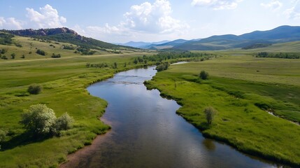 Fototapeta premium Stunning aerial view of a winding river flowing through lush green fields and hills : Generative AI