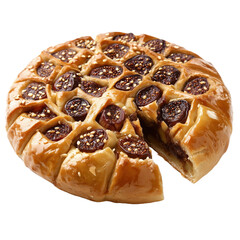 Palestinian fig cake presented on a plate with a slice removed revealing its rich filling