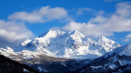 Breathtaking snow capped mountain scene with clear blue sky and majestic peaks under fluffy clouds : Generative AI