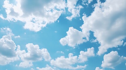 Fluffy white clouds scattered across a bright blue sky providing a serene and calming atmosphere for nature lovers : Generative AI