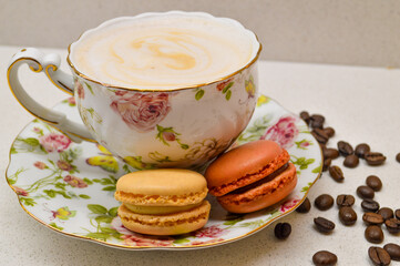 Elegant Coffee Moment – Vintage Cup with Macarons