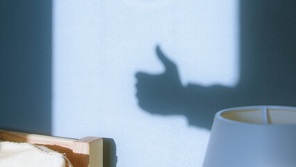 Thumbs Up Hand Gesture Shadow – Symbol of Approval and Positivity