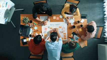 Top view of smart business man put scrum board on table at meeting room while marketing team...
