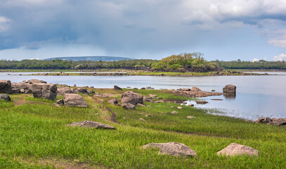 Rocky shore at the lake © Artiom