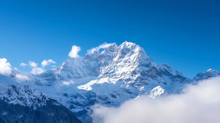 Majestic snowcovered mountain peak under clear blue skies offering breathtaking natural beauty : Generative AI