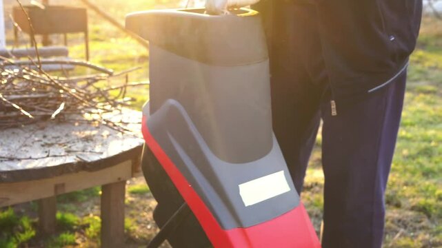 wood chipper, branch shredder for the garden, spring pruning of fruit trees, fertiliser