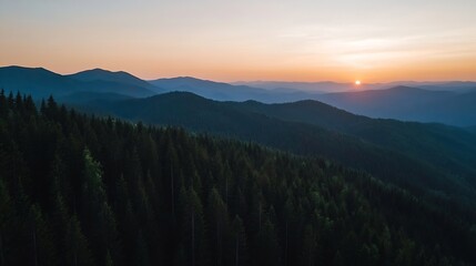 Obraz premium Stunning panoramic view of a mountain range during sunset with vibrant colors in the sky : Generative AI