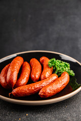 Smoked sausages pork meat beef dish fresh delicious gourmet food background on table rustic food top view copy space