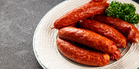 Smoked sausages pork meat beef dish fresh delicious gourmet food background on table rustic food top view copy space