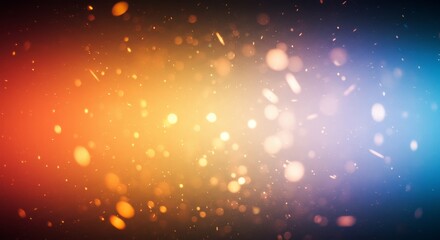 Obraz premium Vibrant Glowing Particles Background - Abstract background featuring glowing particles in shades of orange, yellow, and blue. Perfect for designs