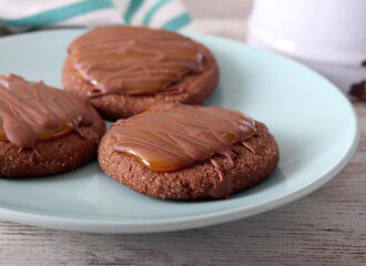 Chocolate cookies with caramel and chocolate