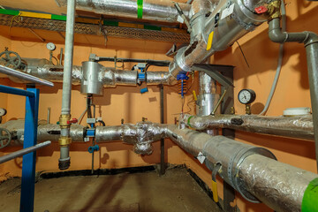 Technical heating pipes in the basement of a building