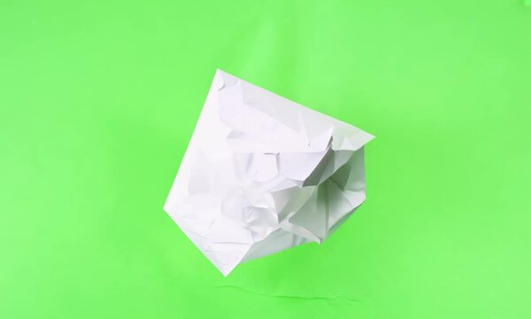 Stop motion animation Torn Paper Transitions on Green Screen Background