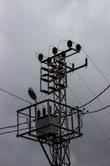 Electric Pole with Transformer Against the Sky