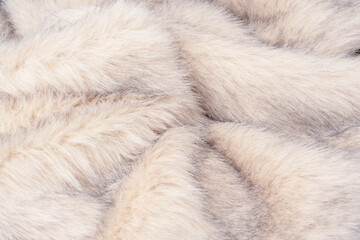 Texture of faux fur as a background, top view.