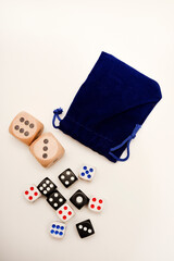 Dice on a white background. Large and small dice.