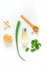 Aloe vera capsules and extract drops. Selective focus.