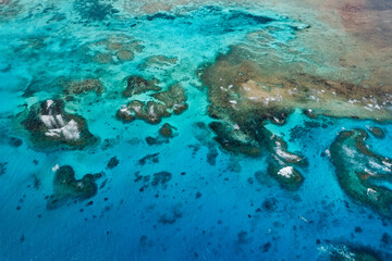 Stunning Aerial View of Abstract Ocean Patterns – A Mesmerizing Display of Fluid Lines, Rich Colors, and Natural Textures, Showcasing the Ocean’s Beauty from Above!