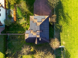 Solar energy rooftop panels on house view