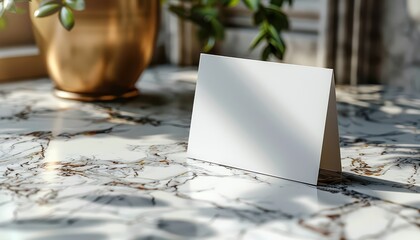 A white card with a triangle shape sits on a marble countertop