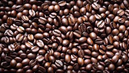 Obraz premium Close-up of roasted coffee beans with rich texture and dark aroma