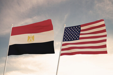 Relations between the countries of the United States of America USA and EGYPT represented by the concept of two flags waving against a cloudy sky.3d render.