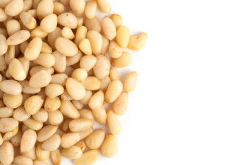 Pine nuts on white background. Top view. Flat lay.